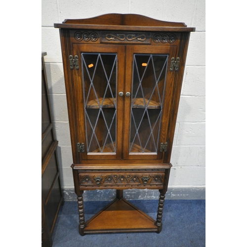 1263 - AN OLD CHARM OAK LEAD GLAZED CORNER CUPBOARD, with a single drawer on turned legs and undershelf, wi... 