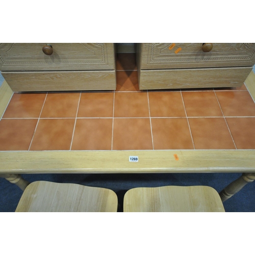 1269 - A MODERN BEECH AND TILE TOP KITCHEN TABLE, length 121cm x depth 76cm x height 74cm, along with two c... 