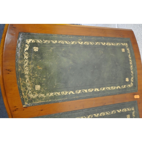 1278 - A YEW WOOD KNEE HOLE DESK, with triple green leather writing surface, nine assorted drawers, on brac... 