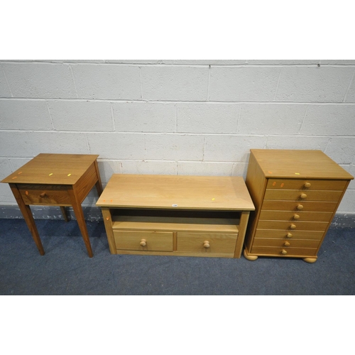 1398 - A LIGHT OAK TV STAND, with two drawers, a chest of four drawers, and a single drawer side table (3)