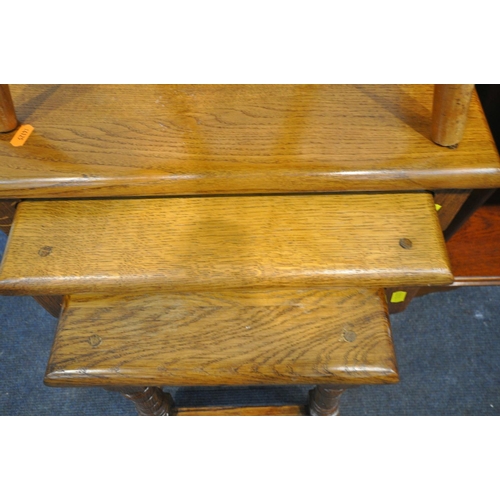 1400 - A SOLID OAK NEST OF THREE TABLES, largest length 50cm x depth 31cm x height 50cm, a Stoolette kidney... 