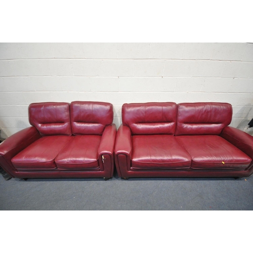 1411 - AN SCS CLARET TWO PIECE LOUNGE SUITE, comprising a three seater sofa 196cm, and a two seater sofa 15... 