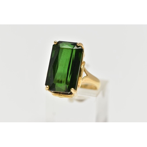 1 - AN 18CT YELLOW GOLD, GREEN TOURMALINE RING, designed with a rectangular cut deep green tourmaline me... 