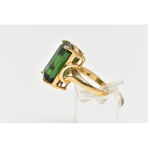 1 - AN 18CT YELLOW GOLD, GREEN TOURMALINE RING, designed with a rectangular cut deep green tourmaline me... 