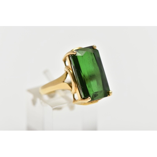 1 - AN 18CT YELLOW GOLD, GREEN TOURMALINE RING, designed with a rectangular cut deep green tourmaline me... 