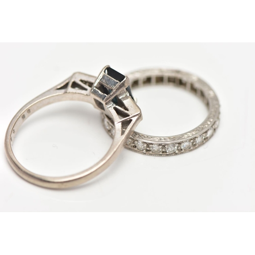 107 - TWO WHITE METAL GEM SET RINGS, the first set with a rectangular cut sapphire, prong set, flanked wit... 