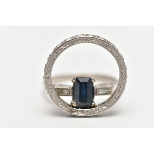 107 - TWO WHITE METAL GEM SET RINGS, the first set with a rectangular cut sapphire, prong set, flanked wit... 