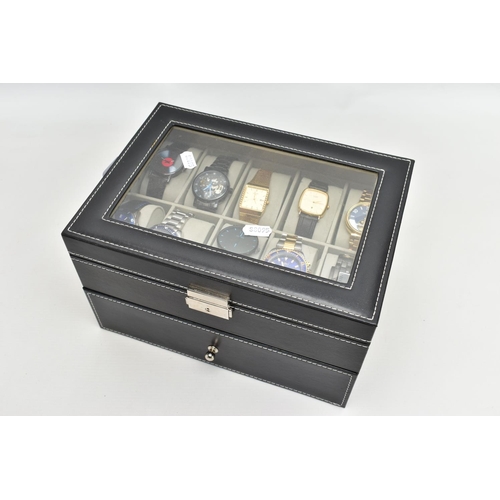 120 - A WATCH DISPLAY CASE WITH WRISTWATCHES, a faux black leather display case, with twenty storage compa... 