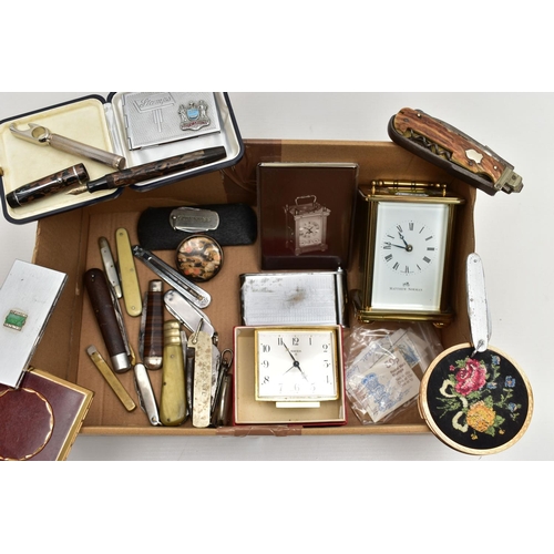 121 - A BOX OF MISCELLANEOUS ITEMS, to include a 'Matthew Norman' carriage clock, key wound with papers, a... 