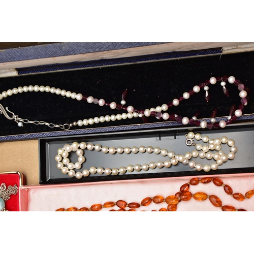 122 - A BOX OF COSTUME JEWELLERY, to include a garnet bead necklace fitted with a lobster clasp, two cultu... 