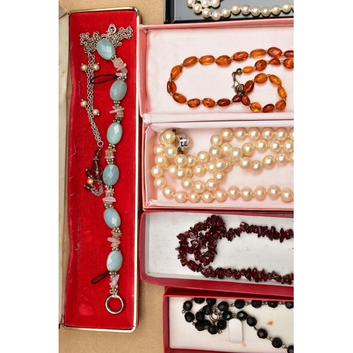 122 - A BOX OF COSTUME JEWELLERY, to include a garnet bead necklace fitted with a lobster clasp, two cultu... 