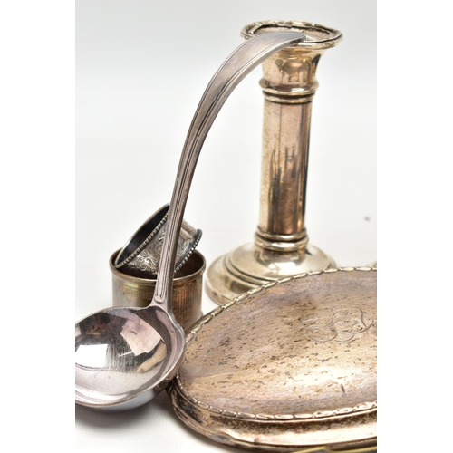 127 - AN ASSORTMENT OF SILVER AND WHITE METAL, to include two matching weighted base candle sticks, hallma... 