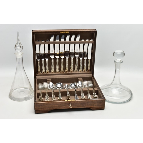 131 - A CASED INCOMPLETE SET OF MAPPIN & WEBB CUTLERY AND TWO GLASS DECANTERS, the incomplete set of plate... 