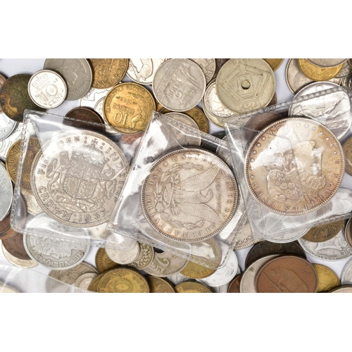 135 - A SMALL BAG OF COINS, to include an Edward VII gold half sovereign coin 1910, two Morgan dollar coin... 