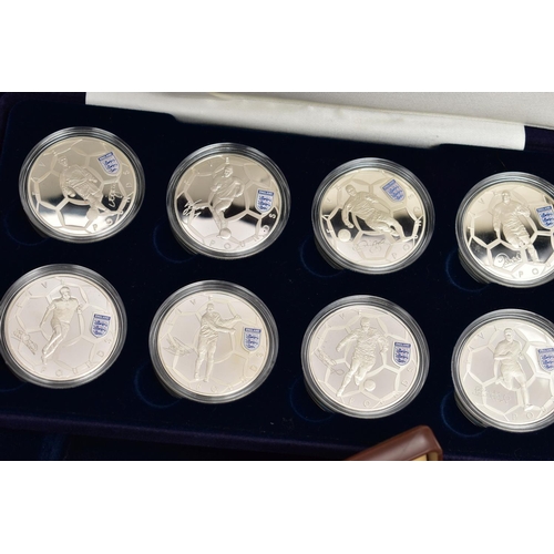 143 - A LARGE AND HEAVY BOX OF COINS AND COMMEMORATIVES, to include a Royal mint 8x £5 Silver proof Englan... 