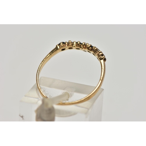 22 - A 9CT GOLD SAPPHIRE AND CUBIC ZIRCONIA WISHBONE RING, the circular cut sapphire and alternately set ... 