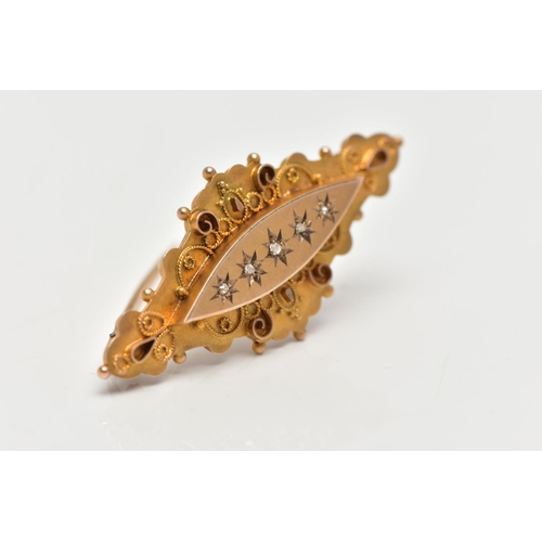 23 - AN EARLY 20TH CENTURY 9CT GOLD DIAMOND BROOCH, designed as a marquise panel, star set with five rose... 