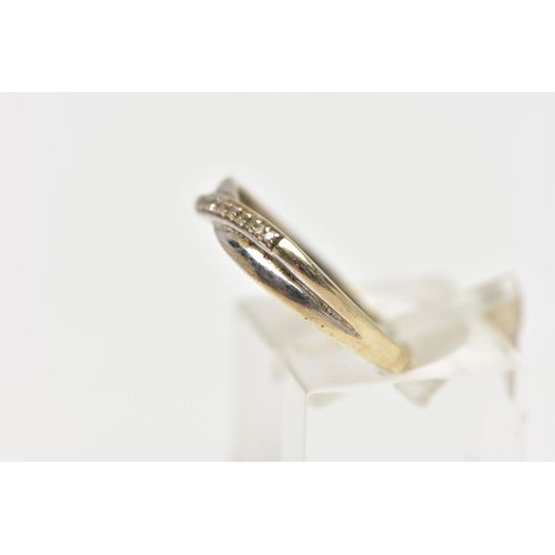 30 - A 9CT WHITE GOLD DIAMOND DRESS RING, the single cut diamond line, set across an asymmetric plain ban... 