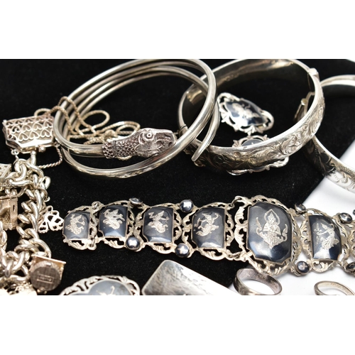 65 - A SELECTION OF SILVER AND WHITE METAL JEWELLERY, to include a silver hinged bangle, hallmarked Chest... 