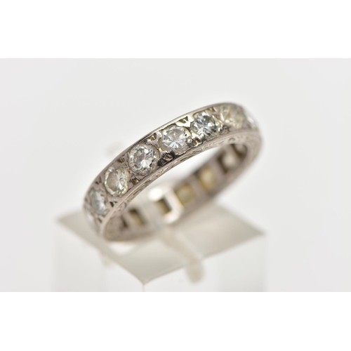 70 - A DIAMOND ETERNITY BAND RING, a full set eternity ring set with nineteen round brilliant cut diamond... 