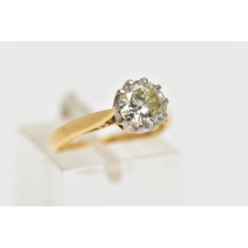 72 - AN 18CT GOLD DIAMOND SINGLE STONE RING, the brilliant cut diamond within a claw setting, to the tape... 