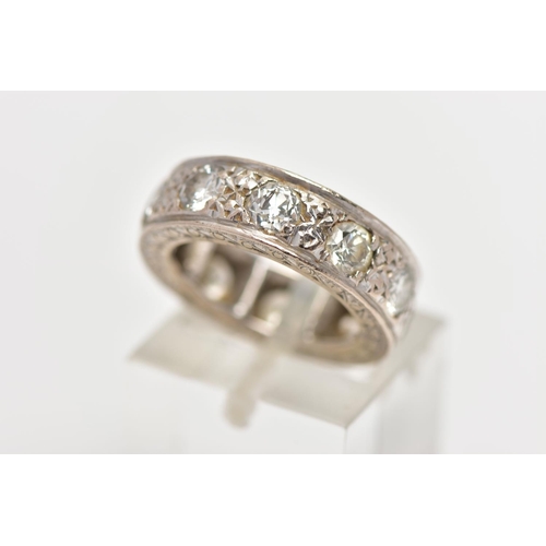 73 - A WHITE METAL DIAMOND FULL ETERNITY RING, comprising a series of brilliant cut diamonds with texture... 