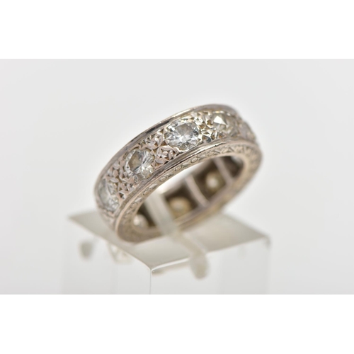 73 - A WHITE METAL DIAMOND FULL ETERNITY RING, comprising a series of brilliant cut diamonds with texture... 