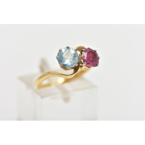 8 - AN 18CT GOLD DRESS RING, a circular cut aquamarine and circular cut glass filled ruby, approximate d... 