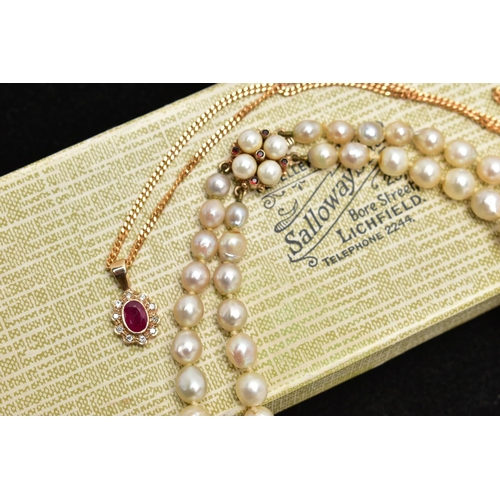 83 - TWO NECKLACES, the first a 9ct gold oval cut ruby and brilliant cut diamond cluster surround, suspen... 