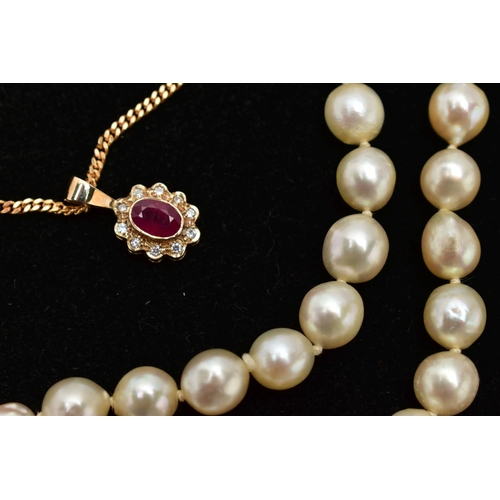 83 - TWO NECKLACES, the first a 9ct gold oval cut ruby and brilliant cut diamond cluster surround, suspen... 