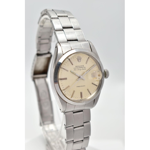 85 - A STAINLESS STEEL 'ROLEX' OYSTER PERPETUAL, automatic movement, round champagne dial, signed 'Rolex'... 