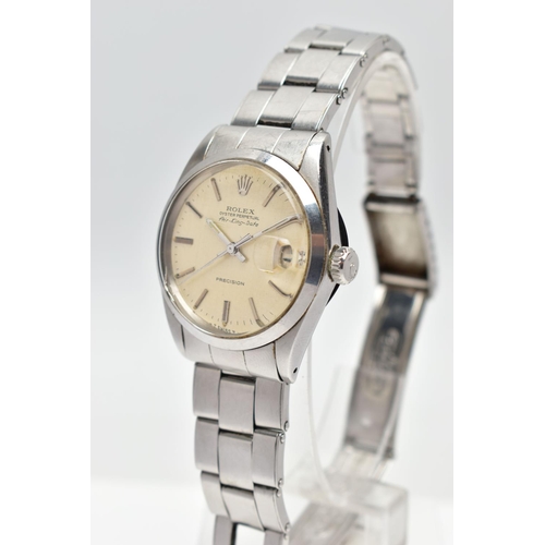 85 - A STAINLESS STEEL 'ROLEX' OYSTER PERPETUAL, automatic movement, round champagne dial, signed 'Rolex'... 