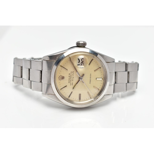 85 - A STAINLESS STEEL 'ROLEX' OYSTER PERPETUAL, automatic movement, round champagne dial, signed 'Rolex'... 