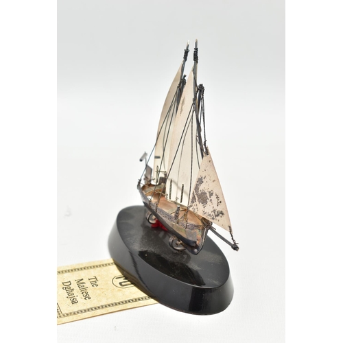 97 - A MODEL OF 'THE MALTESE DGHAJSA', stamped 925 'VM', to an oval black plinth with tag (condition repo... 