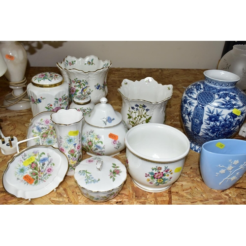 302 - A GROUP OF CERAMIC ORNAMENTS, VASES AND LAMPS comprising a hand painted Japanese Noritake twin handl... 