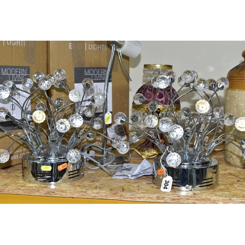 304 - A GROUP OF MODERN LIGHTING comprising, two BHS Athena wall lights (unused still in boxes), a small d... 