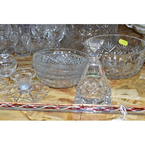 306 - A QUANTITY OF CUT CRYSTAL, comprising Royal Doulton Crystal bud vases, Stuart Crystal dishes and can... 