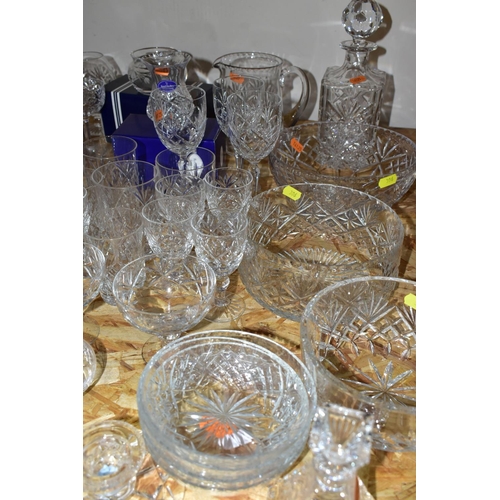 306 - A QUANTITY OF CUT CRYSTAL, comprising Royal Doulton Crystal bud vases, Stuart Crystal dishes and can... 