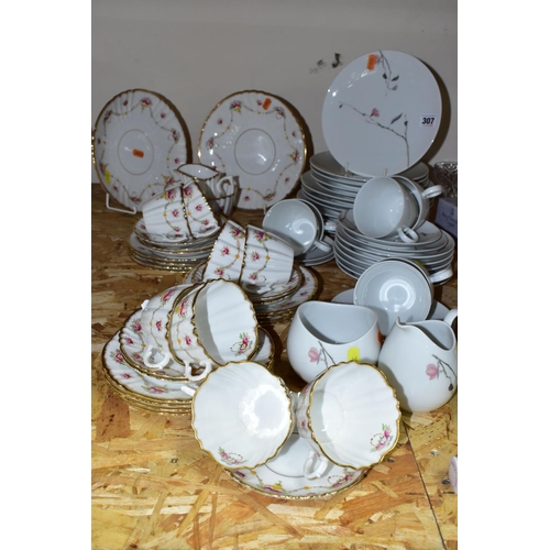 307 - A ROSLYN BONE CHINA TEA SET TOGETHER WITH A ROSENTHAL 'RAYMOND LOWEY' TEA SET,  comprising six cups,... 