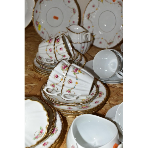 307 - A ROSLYN BONE CHINA TEA SET TOGETHER WITH A ROSENTHAL 'RAYMOND LOWEY' TEA SET,  comprising six cups,... 