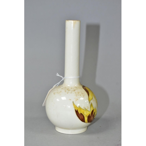 351 - A MOORCROFT POTTERY BUD VASE, 'Leaves in the Wind' yellow and brown leaf pattern on a cream ground, ... 