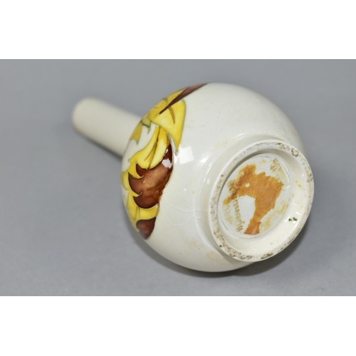 351 - A MOORCROFT POTTERY BUD VASE, 'Leaves in the Wind' yellow and brown leaf pattern on a cream ground, ... 