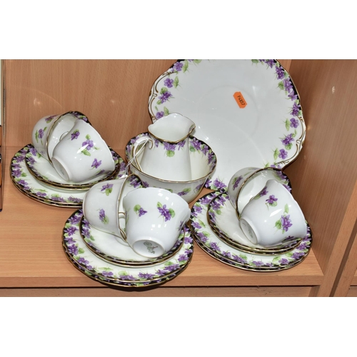 356 - A TWENTY ONE PIECE ROYAL DOULTON VIOLETS H3747 TEA SET, comprising a cream jug, a sugar bowl, a cake... 