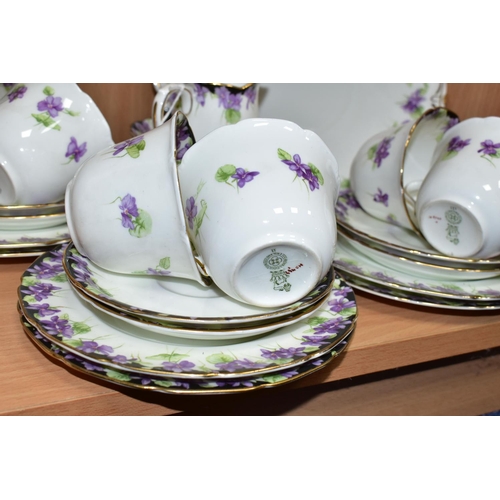 356 - A TWENTY ONE PIECE ROYAL DOULTON VIOLETS H3747 TEA SET, comprising a cream jug, a sugar bowl, a cake... 