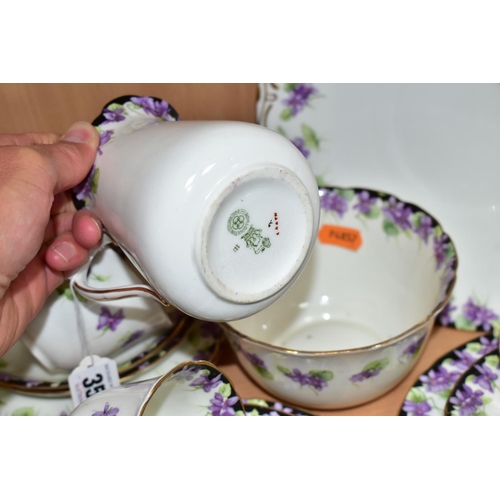 356 - A TWENTY ONE PIECE ROYAL DOULTON VIOLETS H3747 TEA SET, comprising a cream jug, a sugar bowl, a cake... 