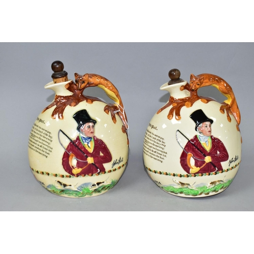 369 - TWO CROWN DEVON JOHN PEEL MUSICAL FLASKS, with wooden stoppers, relief moulded scenes and handles in... 