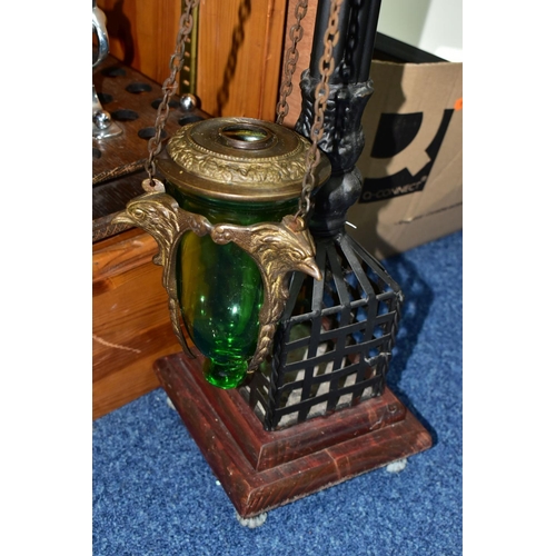 392 - A GROUP OF MISCELLANEOUS ITEMS, comprising  a metal candle stand, height 90cm, a modern green glass ... 