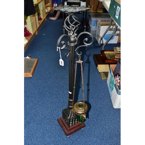 392 - A GROUP OF MISCELLANEOUS ITEMS, comprising  a metal candle stand, height 90cm, a modern green glass ... 