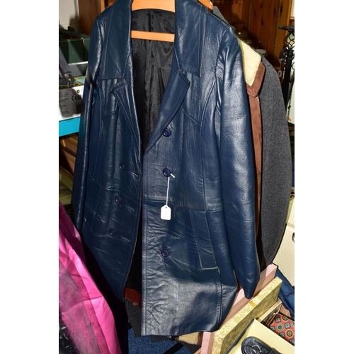 395 - A GROUP OF VINTAGE CLOTHING comprising a ladies blue leather mid length jacket, a men's oxblood leat... 