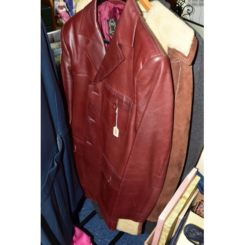 395 - A GROUP OF VINTAGE CLOTHING comprising a ladies blue leather mid length jacket, a men's oxblood leat... 